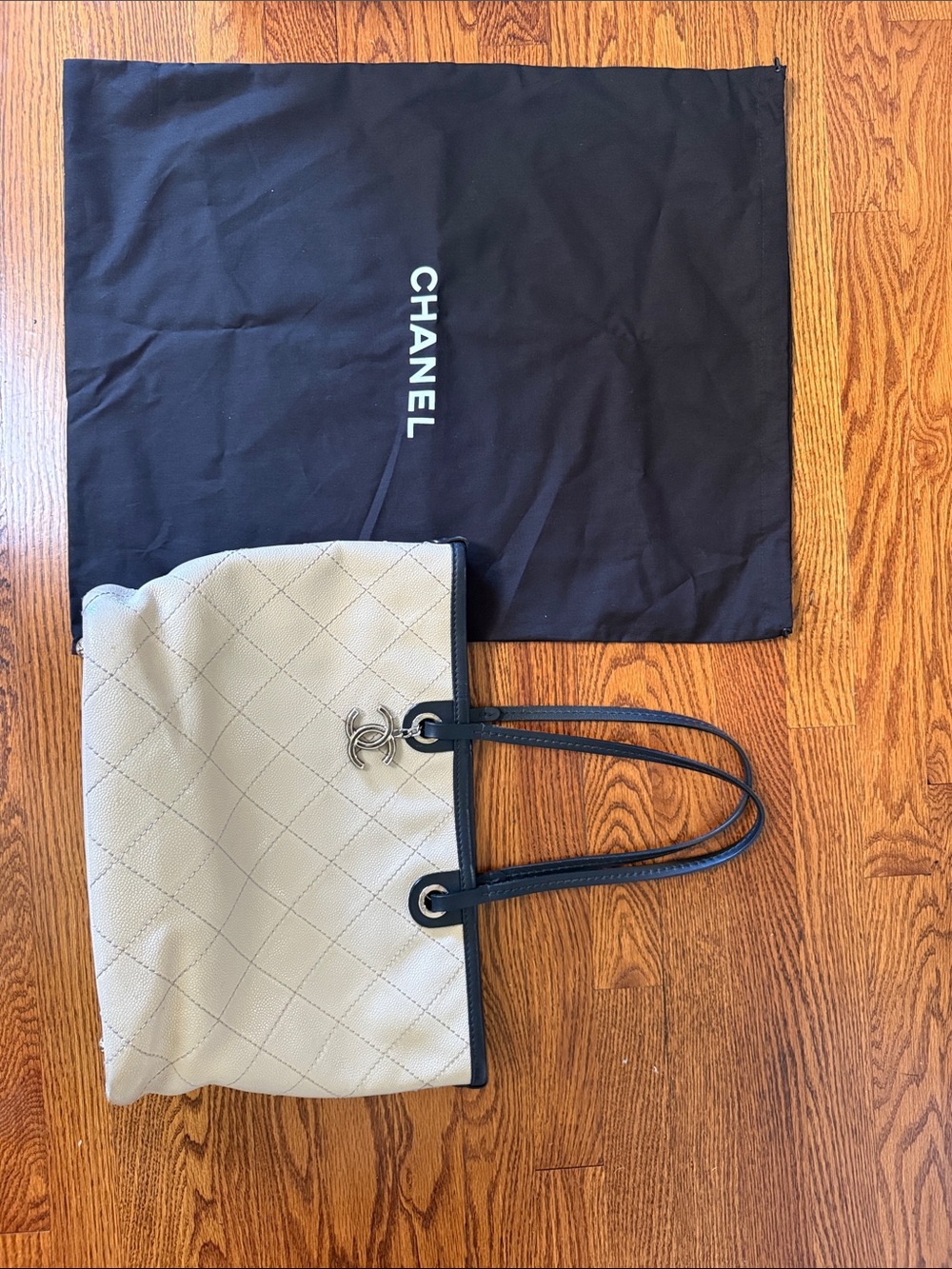 CHANEL Beige Quilted Tote with Black Trim and Double Straps
